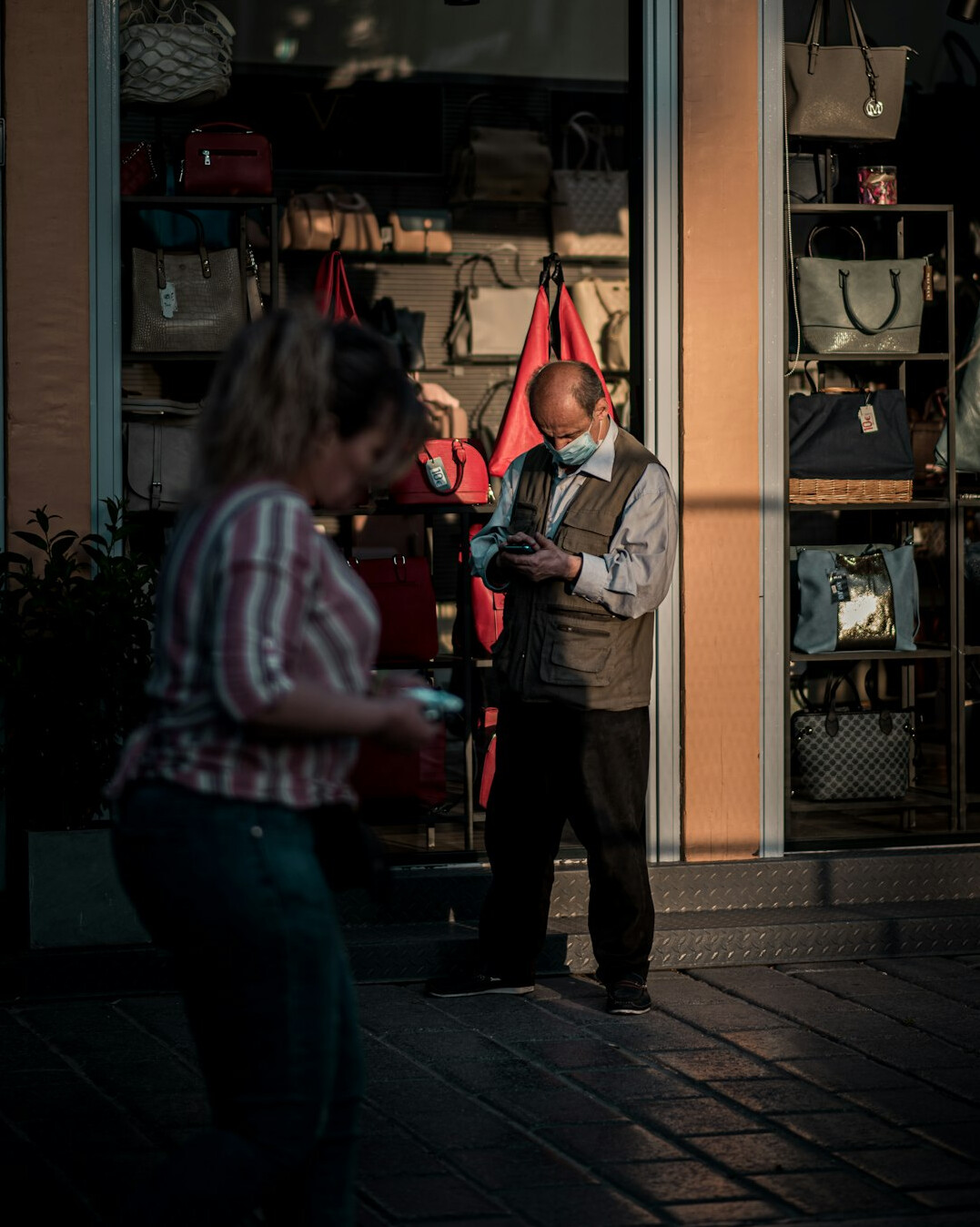 store detective watching shopper