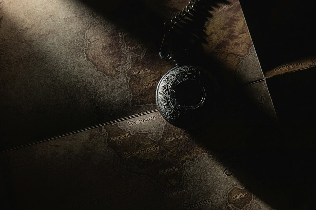Detective's desk with an open notebook, magnifying glass and an old city map